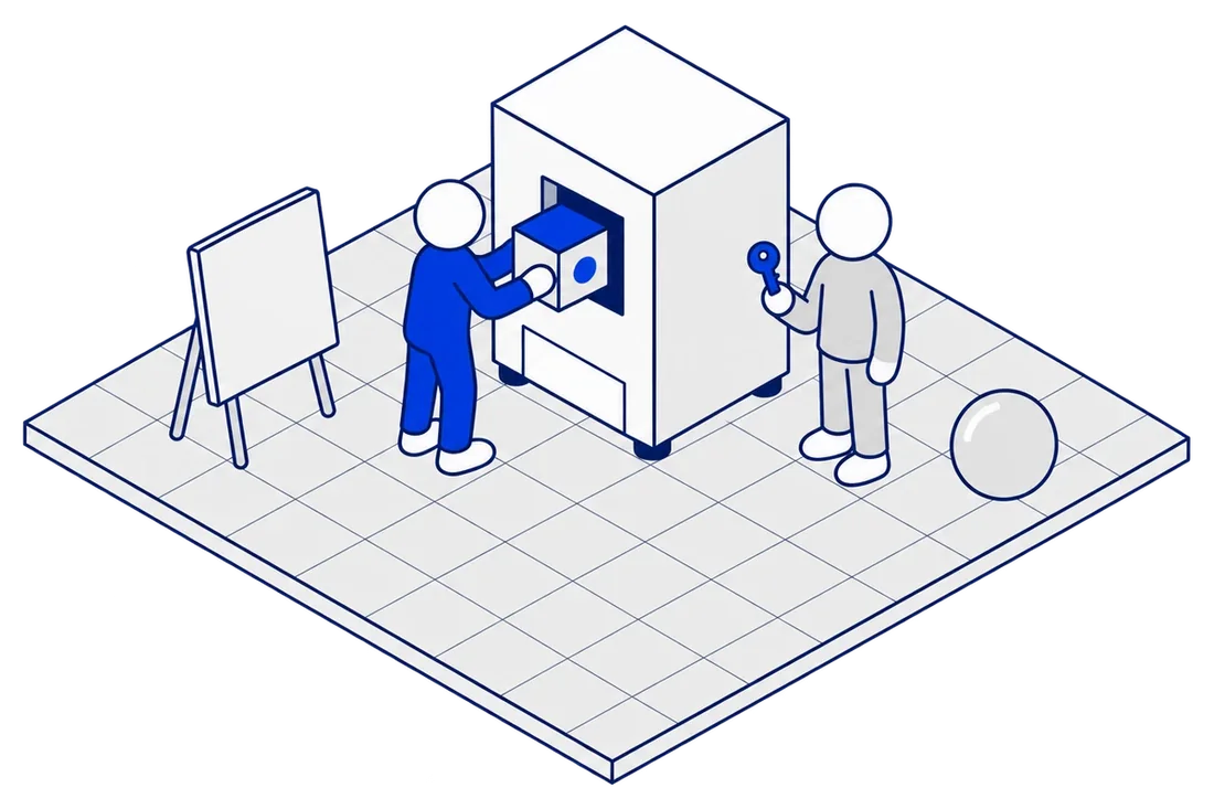 The engineer slides the cobalt module into an exact slot while the owner holds the key; a blank presentation easel and a round ball sit ignored to either side.